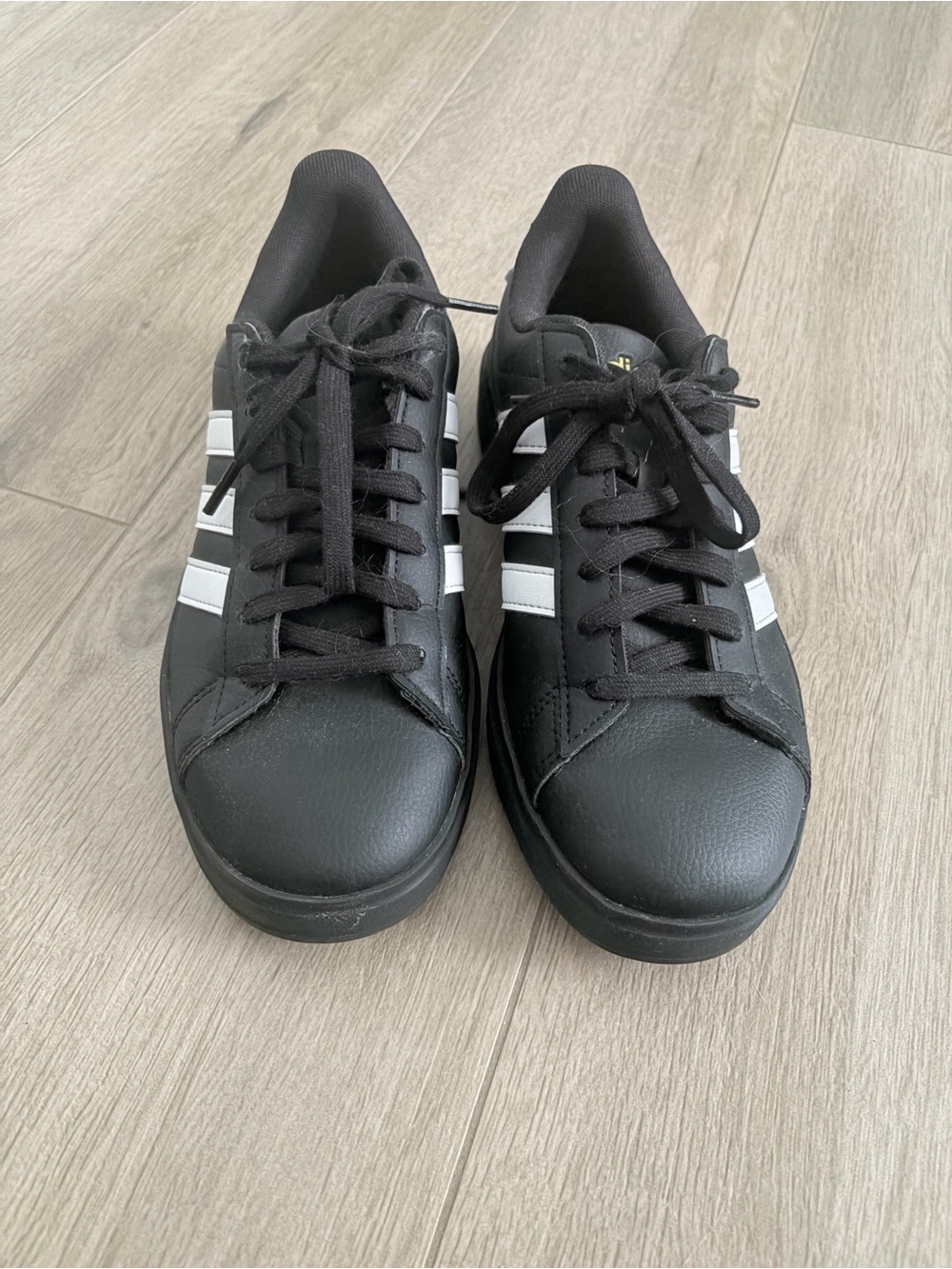 adidas Black Low-Top Sneakers with White Stripes